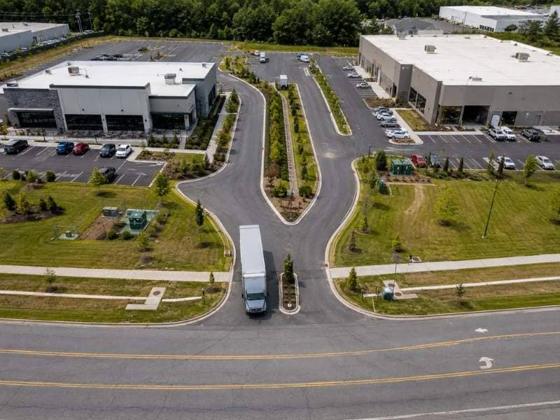  Design engineering checks for shared access drives showing a shared commercial entrance serving two properties with truck access and site circulation
